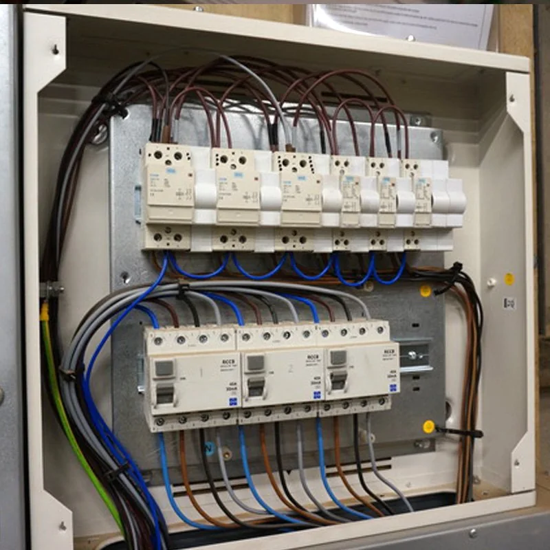 Board with two rows of devices and neatly run cabling, from their gallery